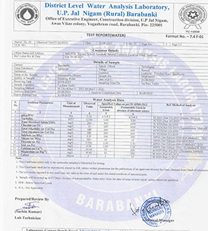 Official water analysis report form from District Level Water Analysis Laboratory Barabanki, featuring sample data tables, headers, and official stamps.